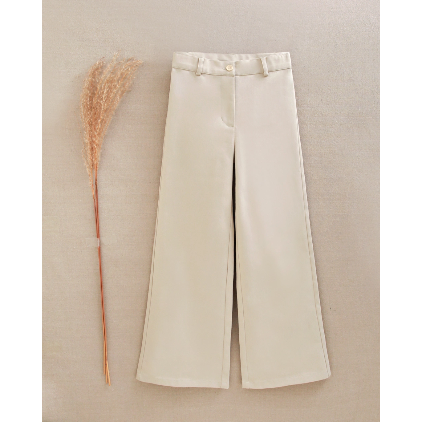 Pantalón largo de niña en beige grisáceo