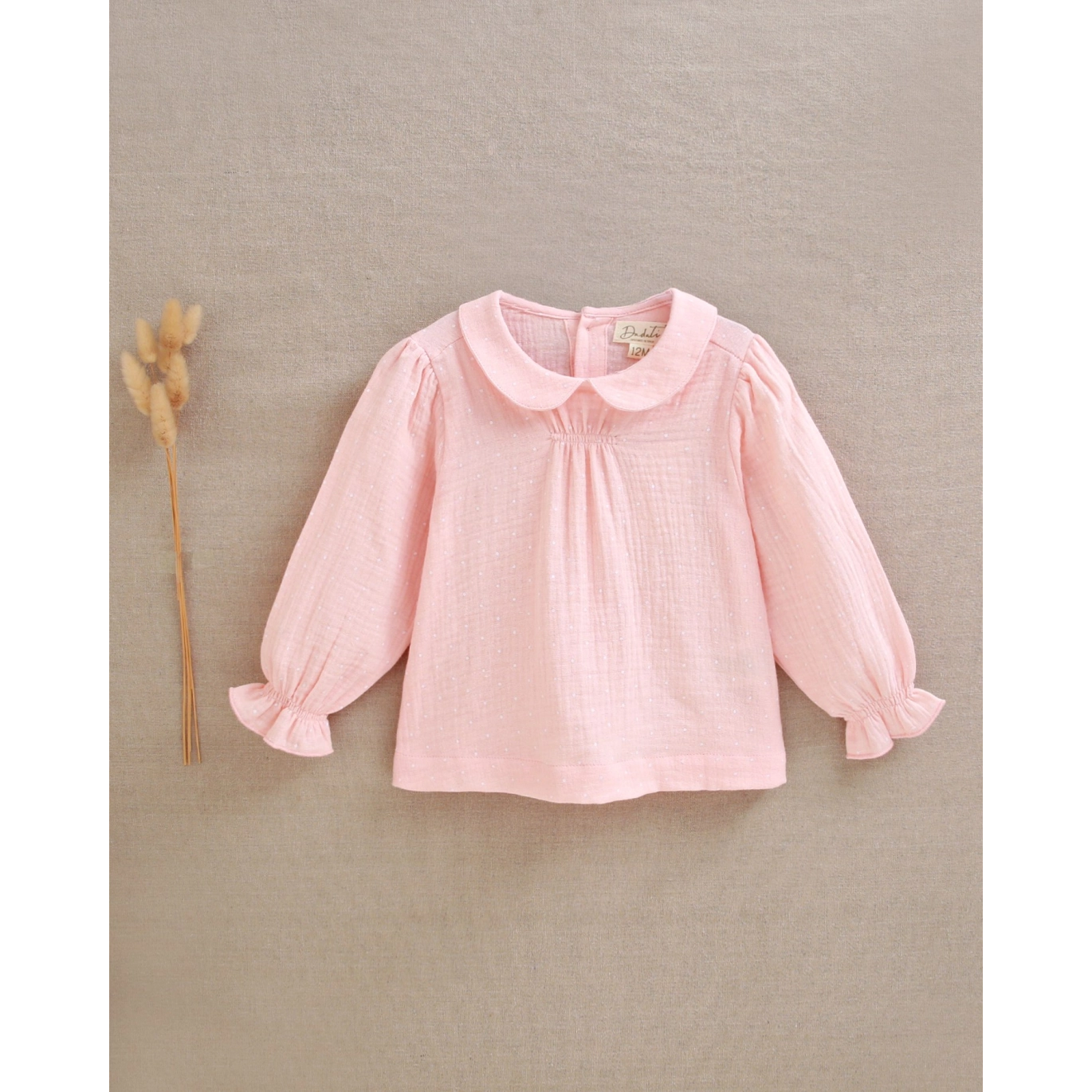 Blusa de bebé niña rosa de bambula con topitos