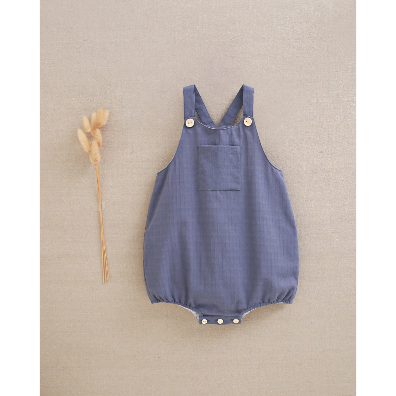 Ranita de bebé niño azul de tirantes con bolsillo delantero