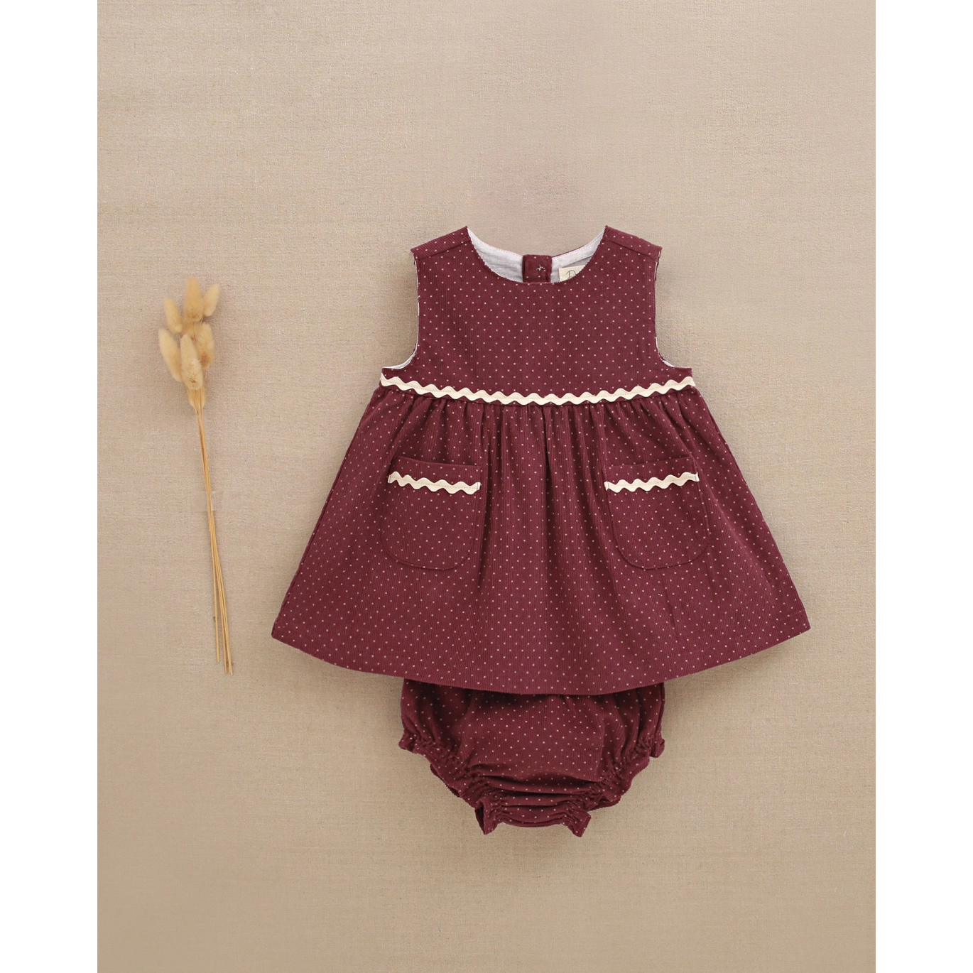 Vestido de bebé niña de pana morado con braguita a juego