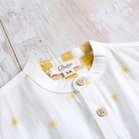 Imagen de Camisa niño con estampado de palmeras y botones de madera