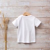 Imagen de Camiseta bebé blanca con estampado de perritos y huellas