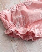Imagen de Vestido bebé Dalía rosa de flores tipo peto