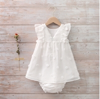 Imagen de Vestido bebé con pompones en relieve blanco 