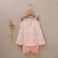 Imagen de Vestido de bebé niña con cubrepañal estampado de flores en tonos rosas