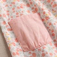 Imagen de Vestido de bebé niña con cubrepañal estampado de flores en tonos rosas