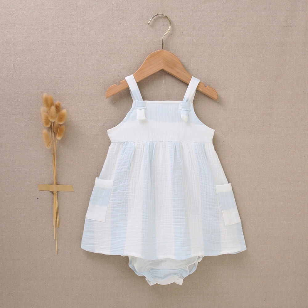 Vestido de bebé niña con cubrepañal azul grisáceo con estrellas blancas.  Dadati - Moda infantil