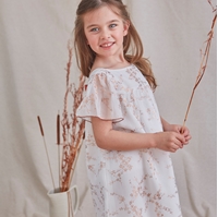 Imagen de Vestido de niña en gasa con estampado en color cobre