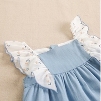 Imagen de Vestido de bebé niña en lino azul combinado con gasa estampada