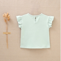 Imagen de Camiseta verde para bebé niña con dibujo de tazas