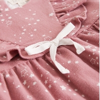 Imagen de Vestido niña rosa de franela con estampado de estrellas blancas