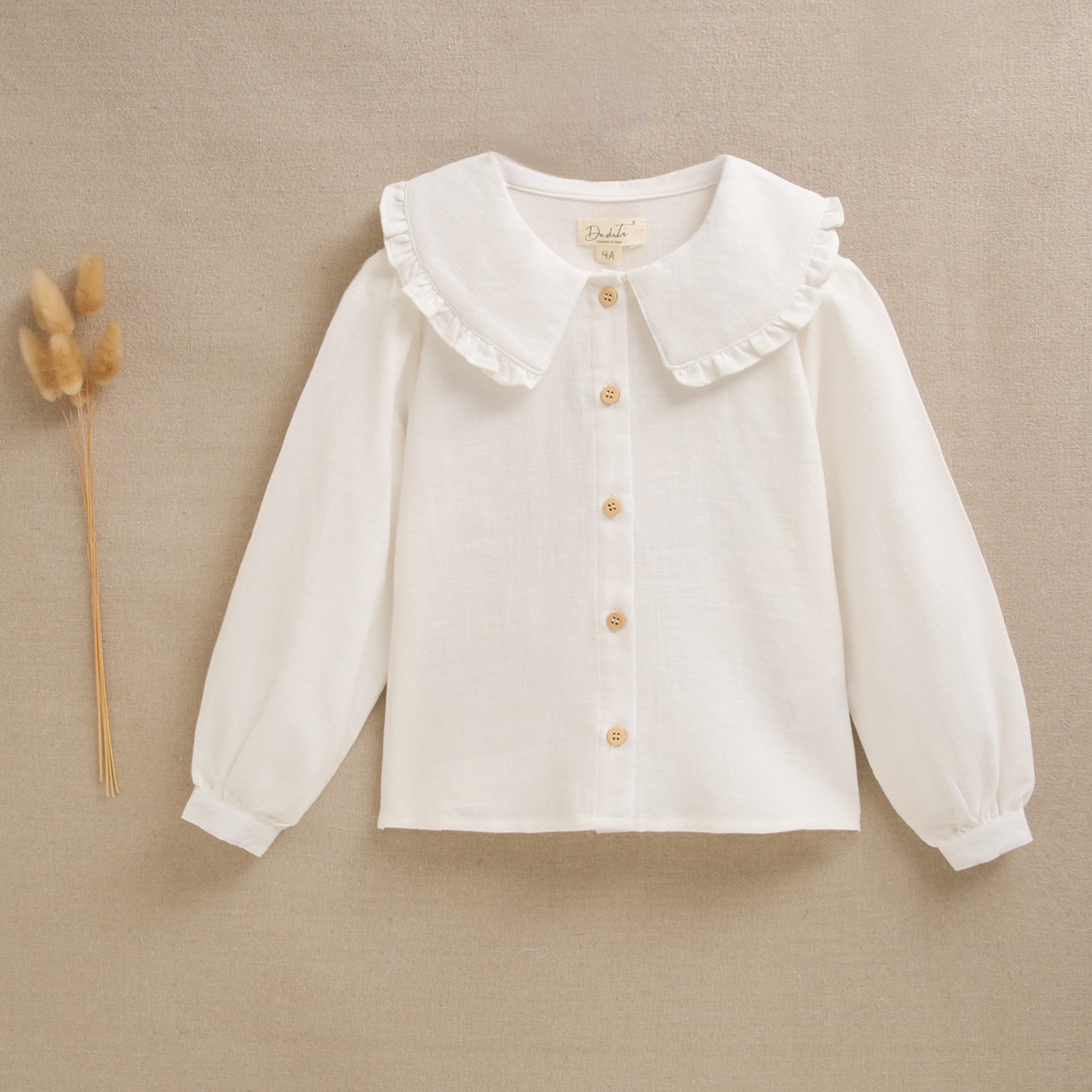 Imagen de Blusa de niña blanca con cuello peter pan