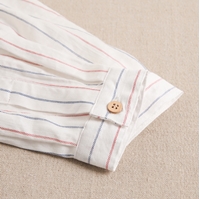 Imagen de Camisa de niño blanca con rayas azules y rojas