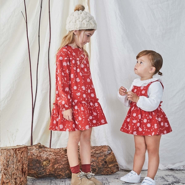 Imagen de Pichi de bebé niña lazado en la espalda de estampado de diente de león en rojo y blanco 