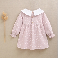 Imagen de Vestido bebé niña rosa palo de franela con estampado de triángulos blancos y cuello bebé
