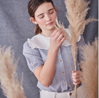 Imagen de Blusa de niña en cuadros vichy azules y blancos
