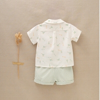 Imagen de Conjunto de bebé niño con pololo de cuadros vichy verdes y blancos y camisa blanca con estampado de patitos