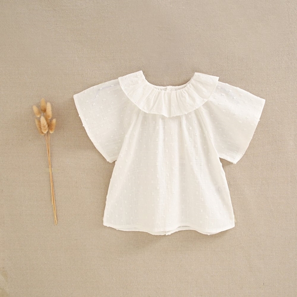 Imagen de Blusa de bebé niña en plumeti blanco