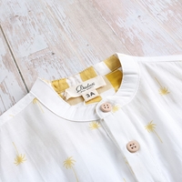 Imagen de Camisa niño con estampado de palmeras y botones de madera