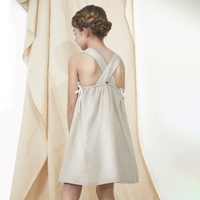 Imagen de Vestido de niña en color beige con tirantes