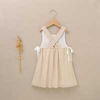 Imagen de Vestido de niña en color beige con tirantes