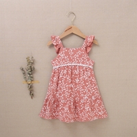 Imagen de Vestido de niña en bambula de color rosa con estampado de topos blancos