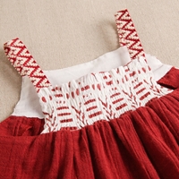 Imagen de Vestido de bebé niña con cubrepañal granate con tirantes y estampado étnico