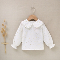 Imagen de Blusa de bebé niña blanca con estampado de estrellas amarillas