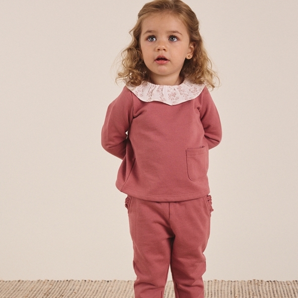 Imagen de Conjunto de bebé niña de sudadera con cuello volante y pantalón en rosa