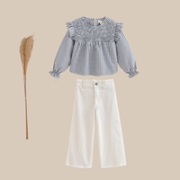 Imagen de Conjunto de niña de blusa de cuadro vichy azul y blanco con pantalón culotte blanco