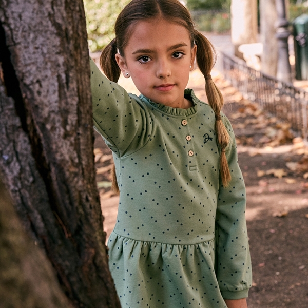 Imagen de Vestido de niña en felpa perchada verde con topos de purpurina azul